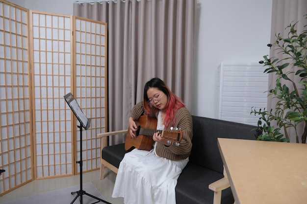 Student practicing breath control exercises in modern music training studio